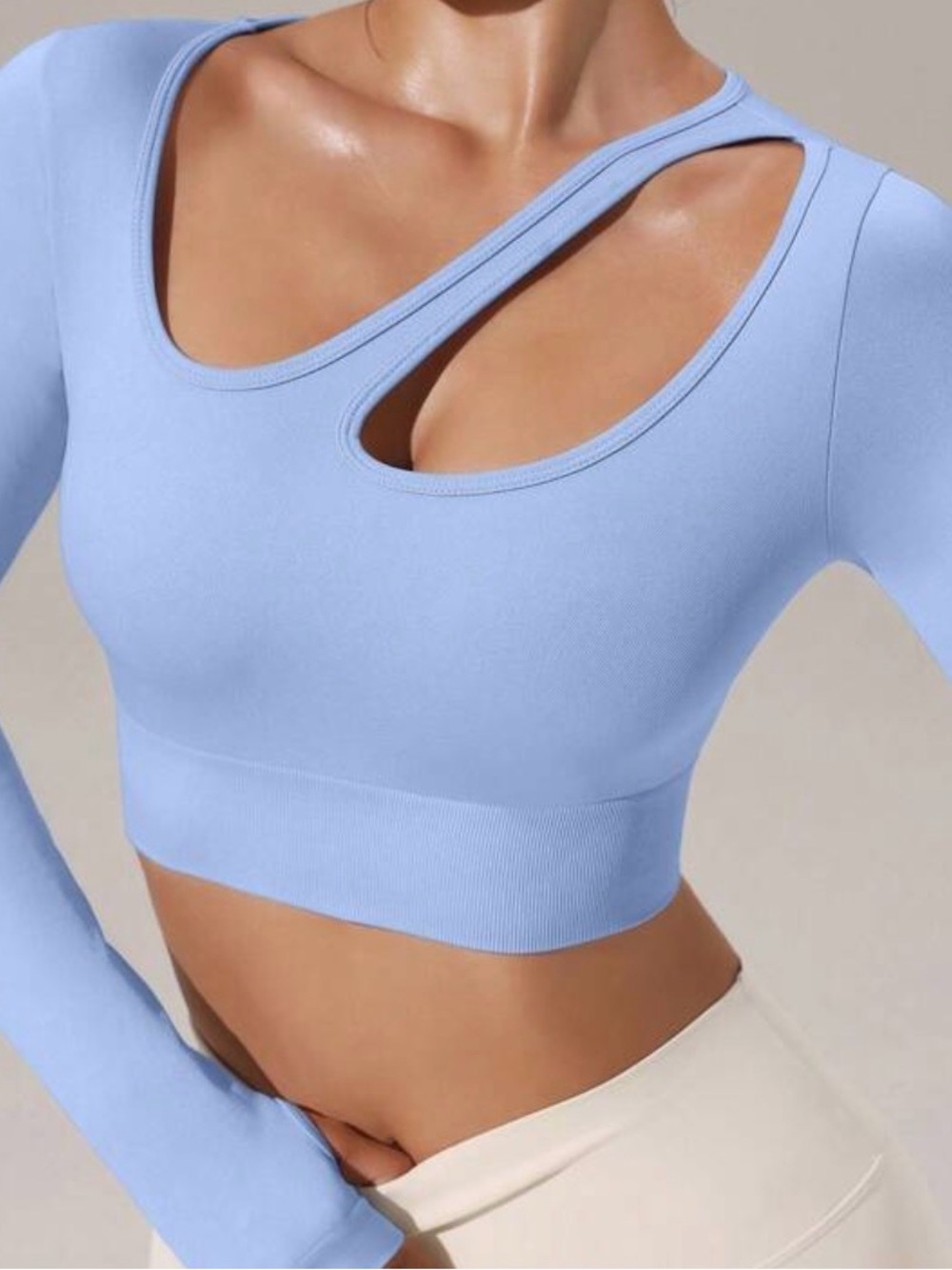 iHeartRaves Pastel Blue Asymmetric Cutout Long Sleeve Crop Top